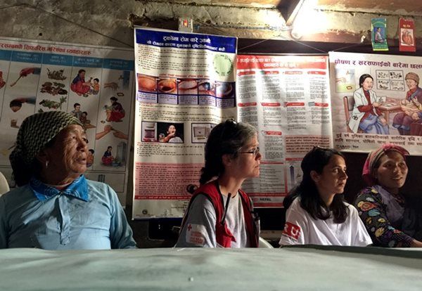 Listening to community health volunteers in Goljung, Rasua district.