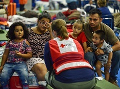 Family in a Red Cross shelter