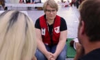 Red Cross worker talking