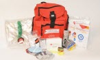 Red Cross red backpack, surrounded by essential disaster items