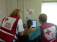 Red Cross Call Centre worker conducts a confidential telephone interview with an affected resident in Alberta.