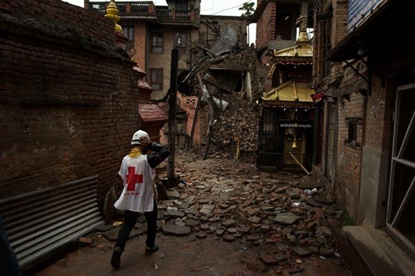 Nepal Red Cross volunteer assisting in search and rescue efforts