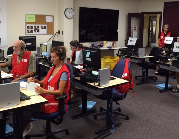 Red Cross volunteers are busy taking calls to help people evacuated as a result of the fires.