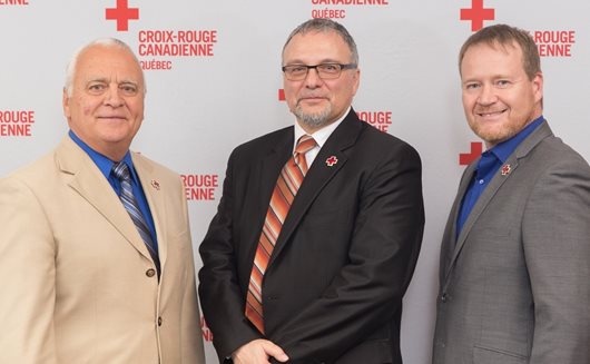 Jean-Claude Bellavance, President of the Board of Governors, Canadian Red Cross, Quebec Division, Daniel Jean, Director, Entraide Secretariat, Public and Parapublic Sectors and Pascal Mathieu, Quebec Vice President of the Canadian Red Cross