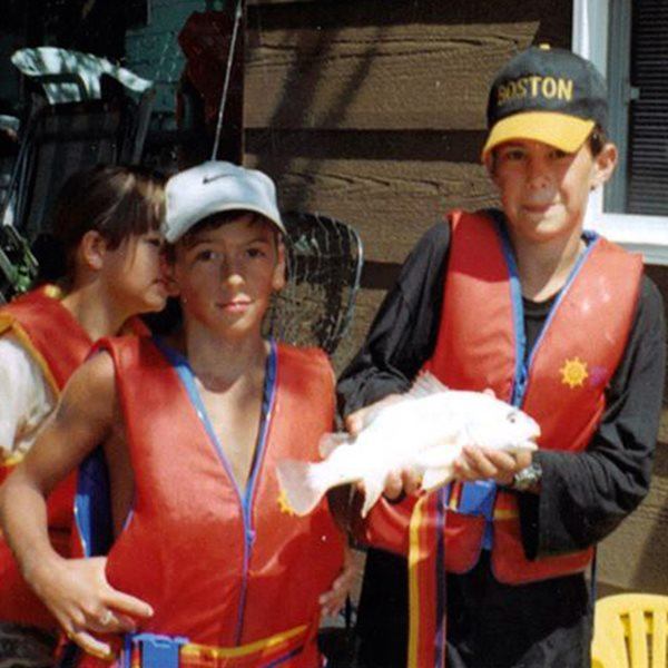 Young boys wearing lifejackets 