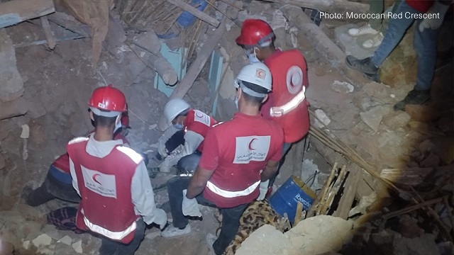 Red Cross Red Crescent volunteer surveys damage in Morocco