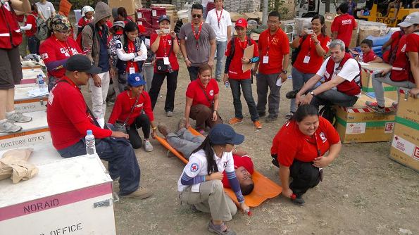 Philippine Red Cross staff and volunteers take part in training before the handover of the Canadian Red Cross emergency field hospital