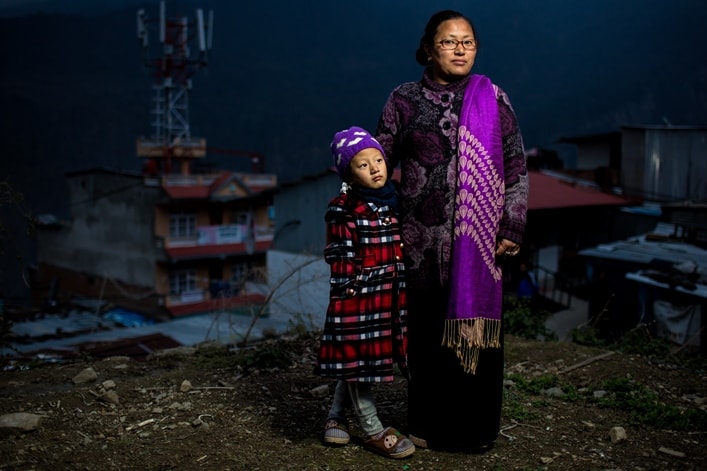 Samita and her daughter at dusk in Dhunche