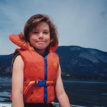 Young girl wearing a lifejacket