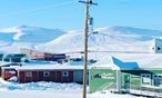 A landscape of houses in the winter in Nunavut