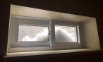 Snow above basement window