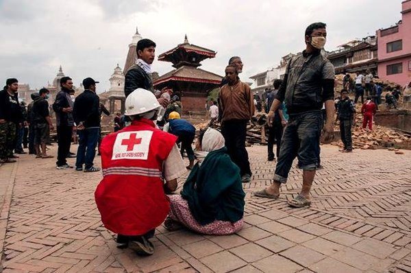 Nepal Red Cross volunteer provides first aid