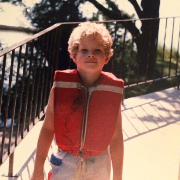 Boy wearing lifejacket