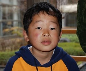 Koya as an 8 year old, shortly after a tsunami hit his hometown in Japan in 2011