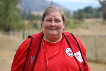 Cheryl Horgan pictured outside in her Canadian Red Cross vest.