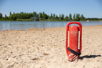 Lifeguarding equipment sitting on a beach