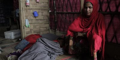 Fatema Khatun, a mother of four in her makeshift shelter
