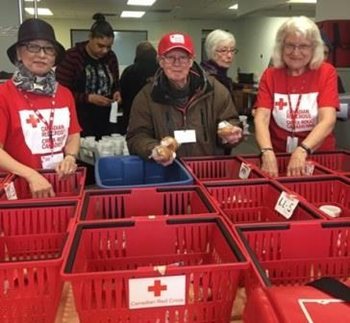 Bill, Dorrie and Johanne, Canadian Red Cross volunteers