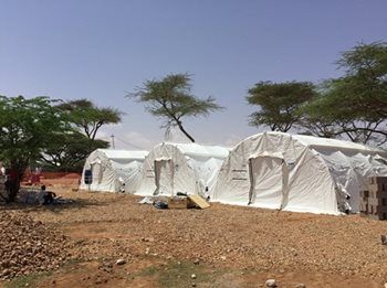 The treatment centre was set up originally to house 60 patients, divided between four large tents. However, patient flow is higher than expected.