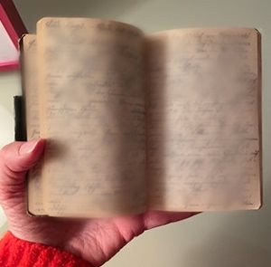 A blurred image of an old diary