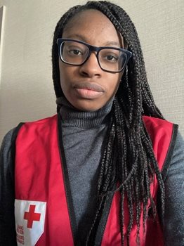 Lola pictured in a Canadian Red Cross vest