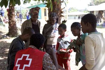 Red Cross workers at a distribution site