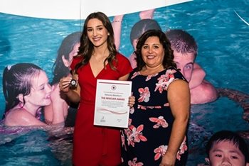 Rebecka Blackburn, pictured here with her mother, receiving the Canadian Red Cross Rescuer Award.